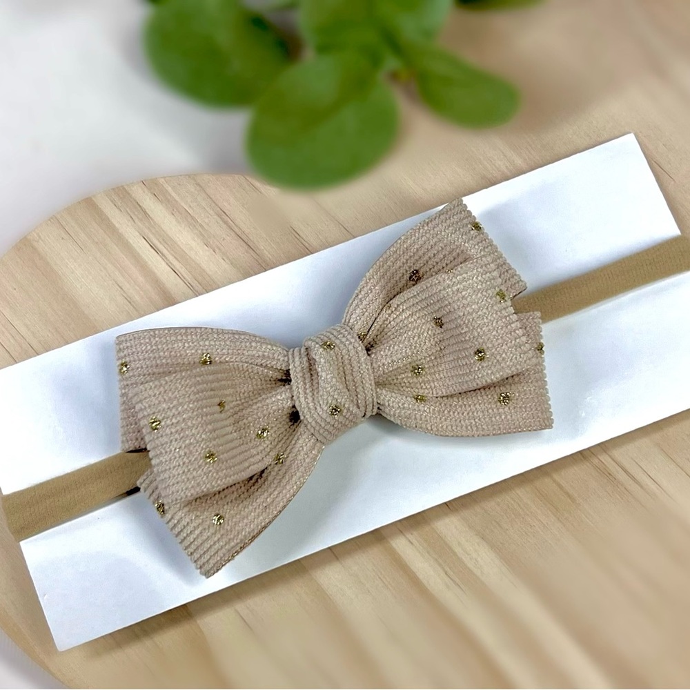 Chic Beige Bow Headband with Gold Dots